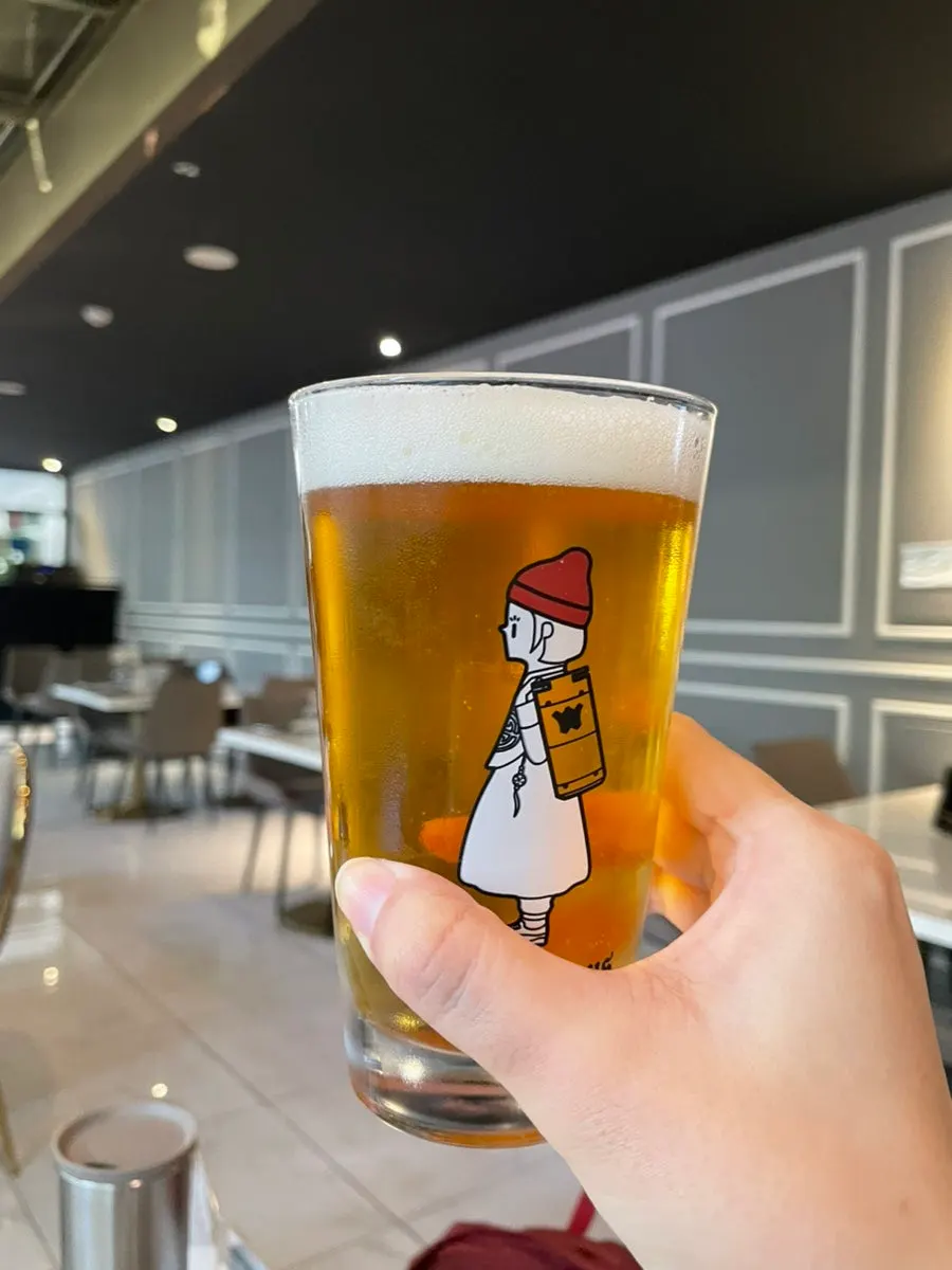 A glass of That Man's Weizen beer