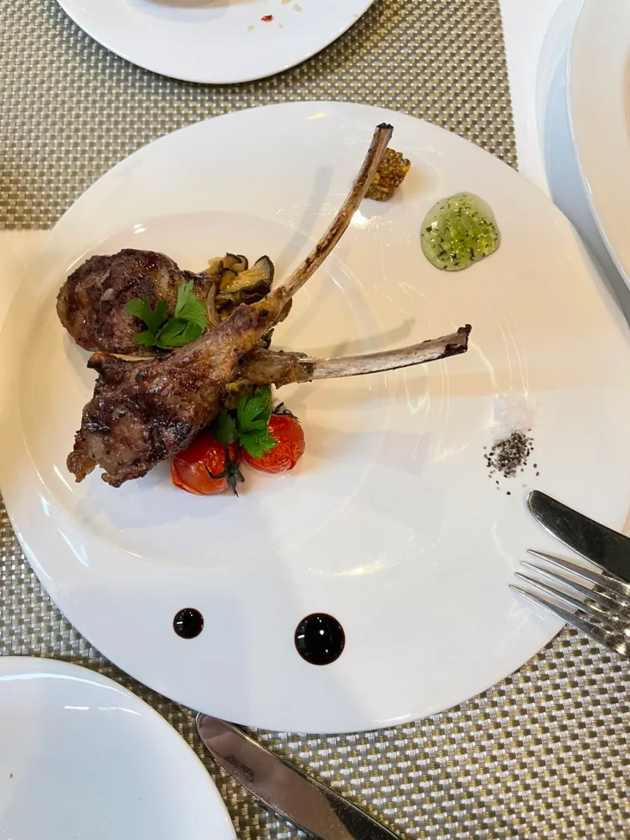 Medium-cooked lamb rib steak