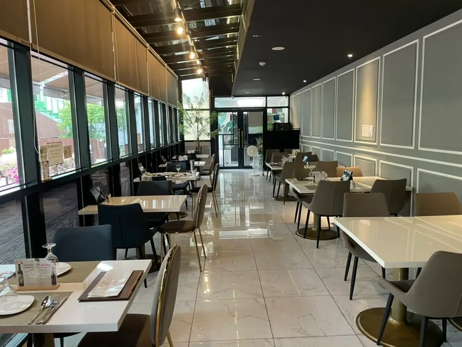 Restaurant interior with wide table spacing