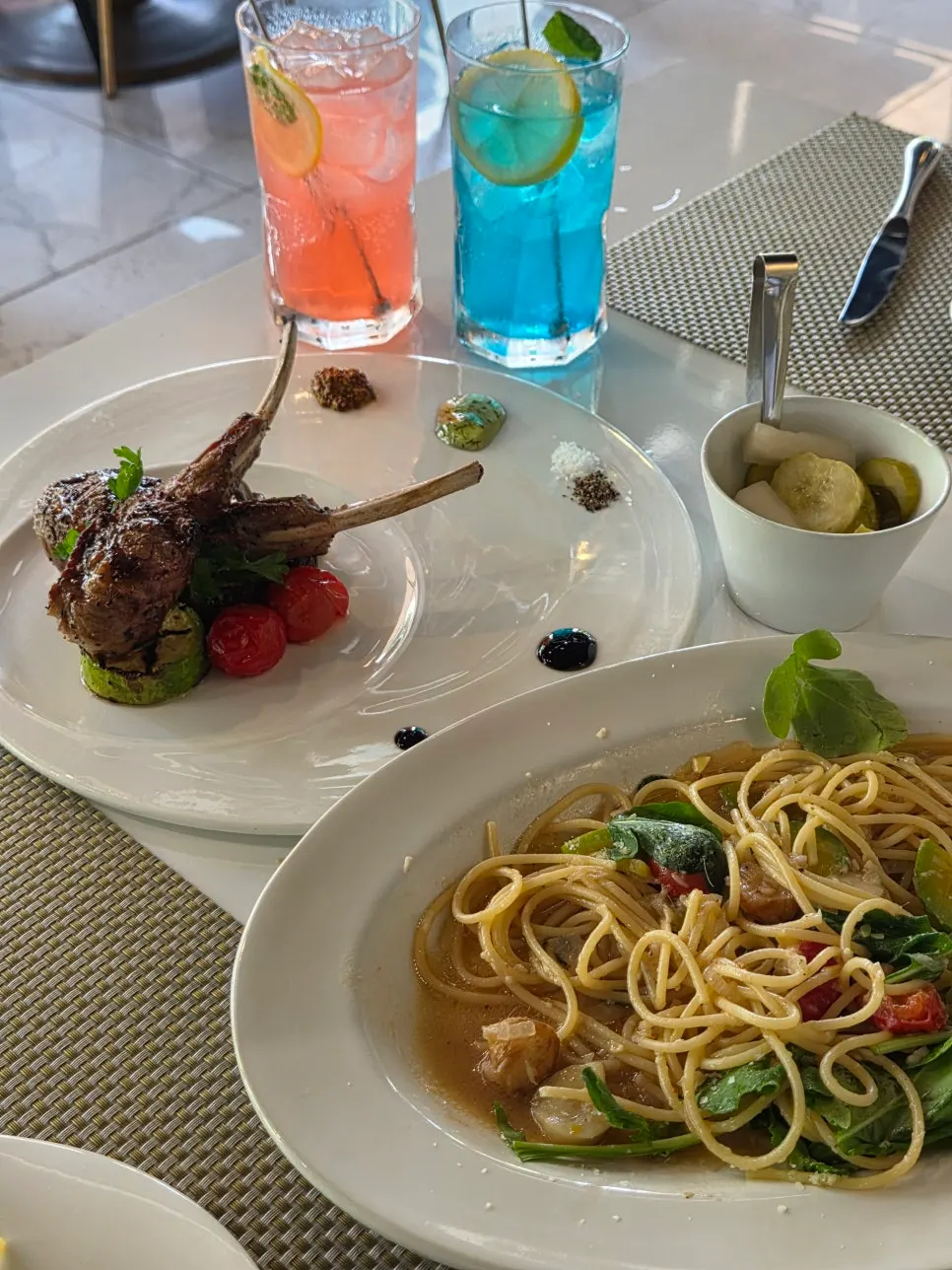 Table set with highballs and main dishes