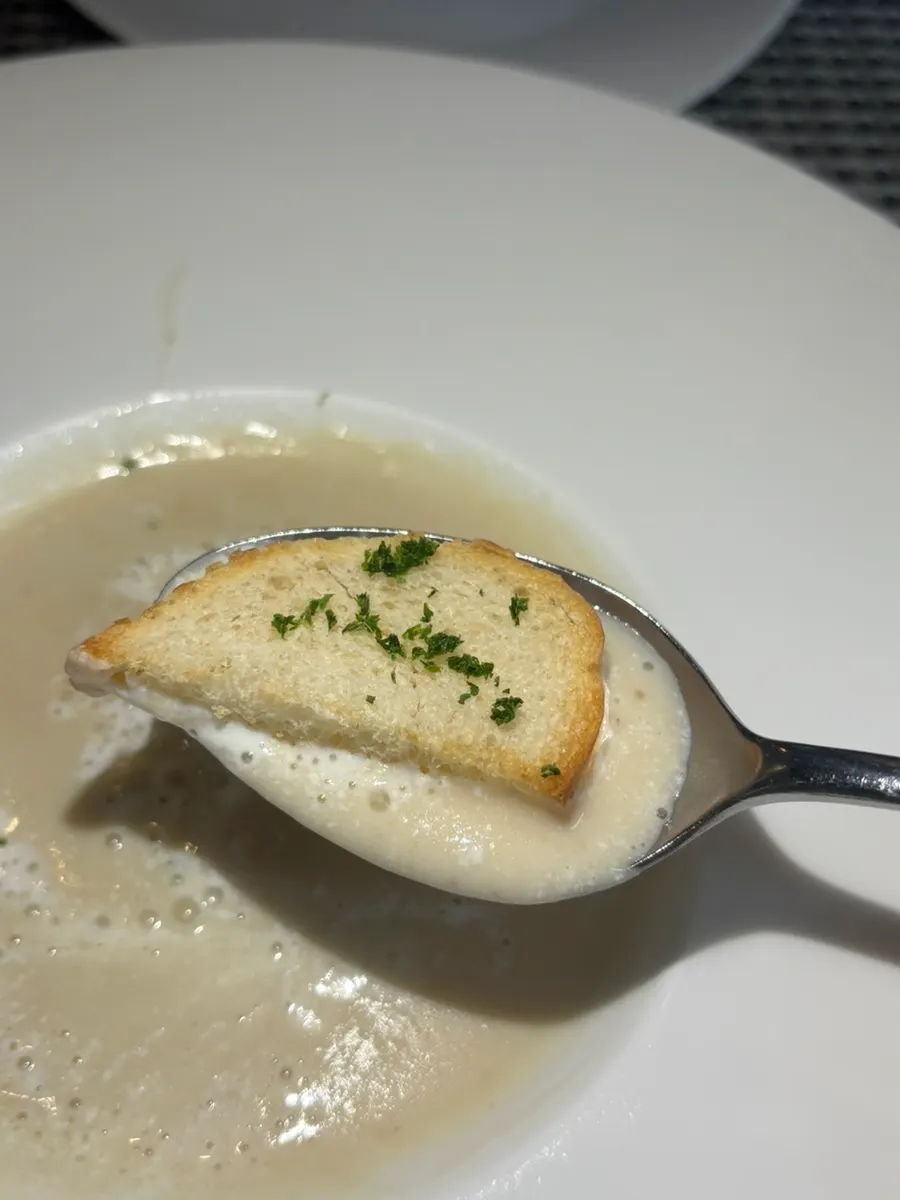 A bowl of smooth, creamy potato cream soup