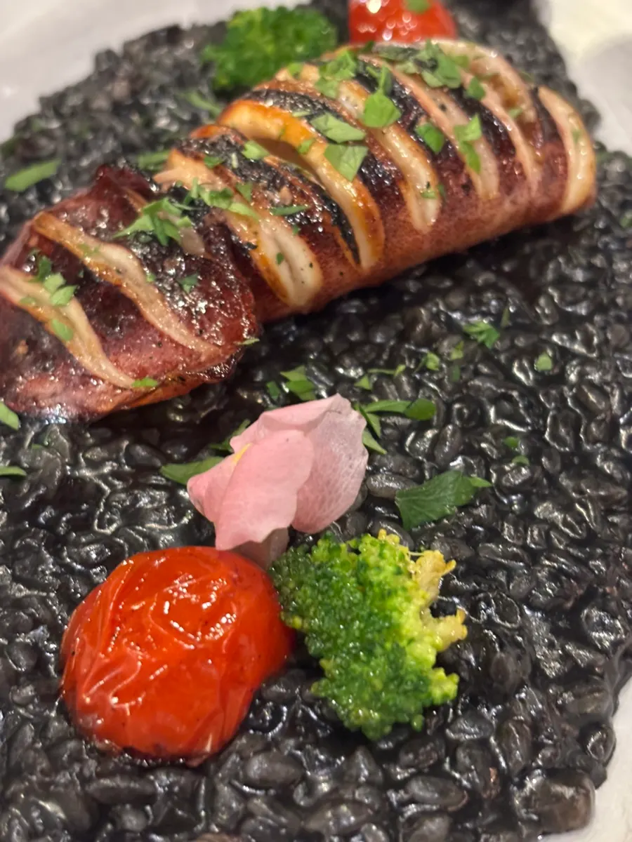 Whole squid ink risotto
