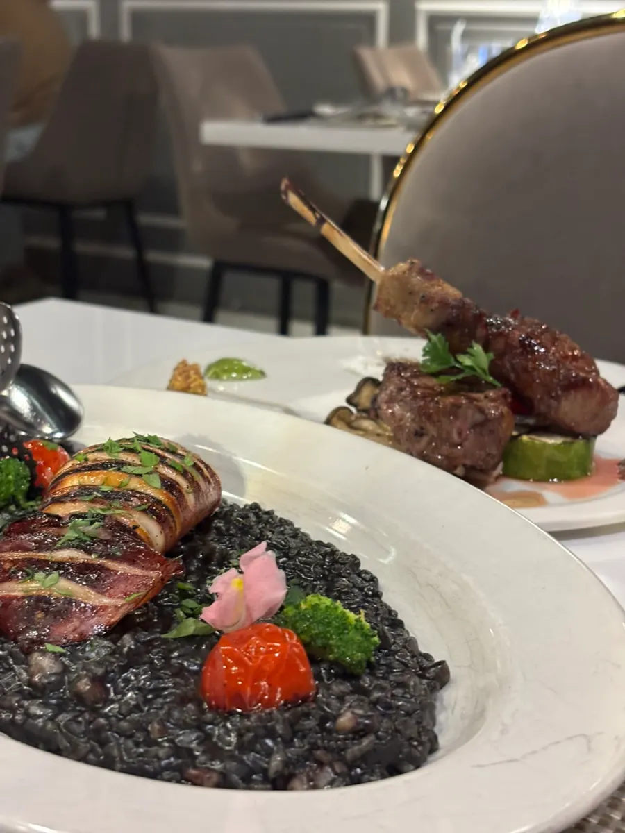 Plate of squid ink risotto