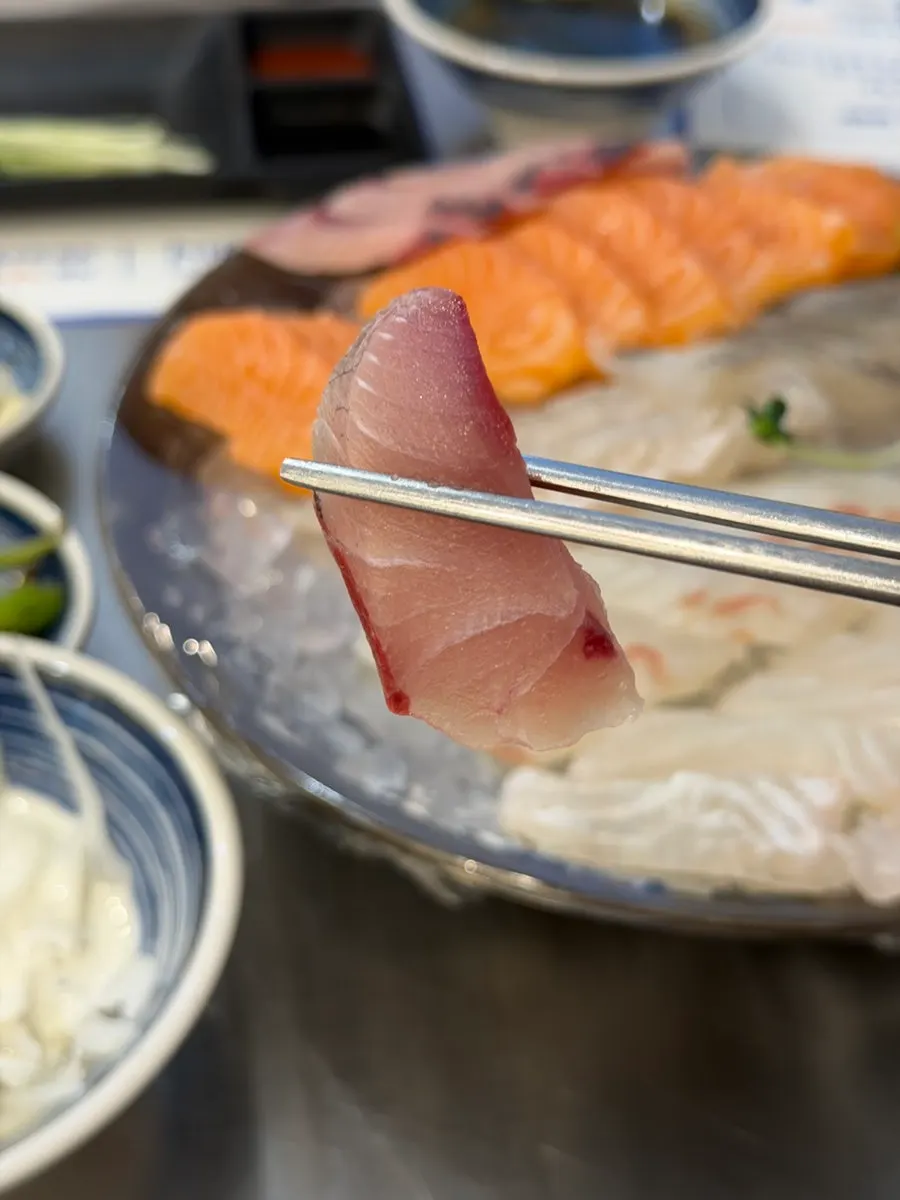 Assorted sashimi with a variety of sauces