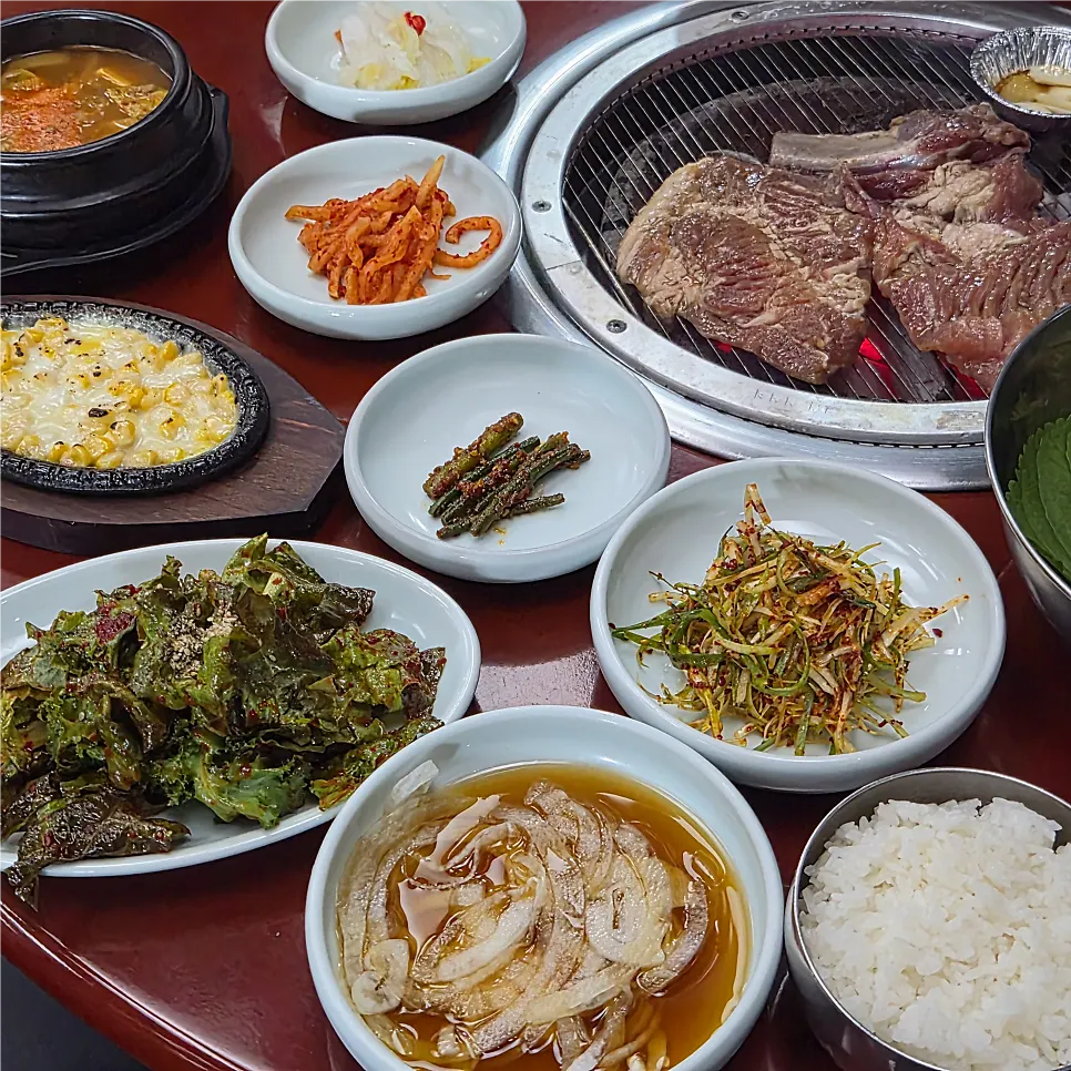 A table filled with assorted side dishes