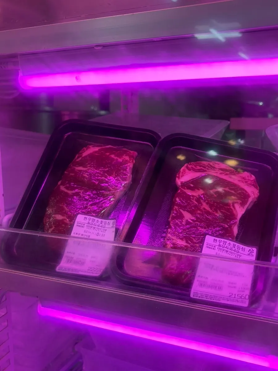 Refrigerated case with grilling beef cuts on display