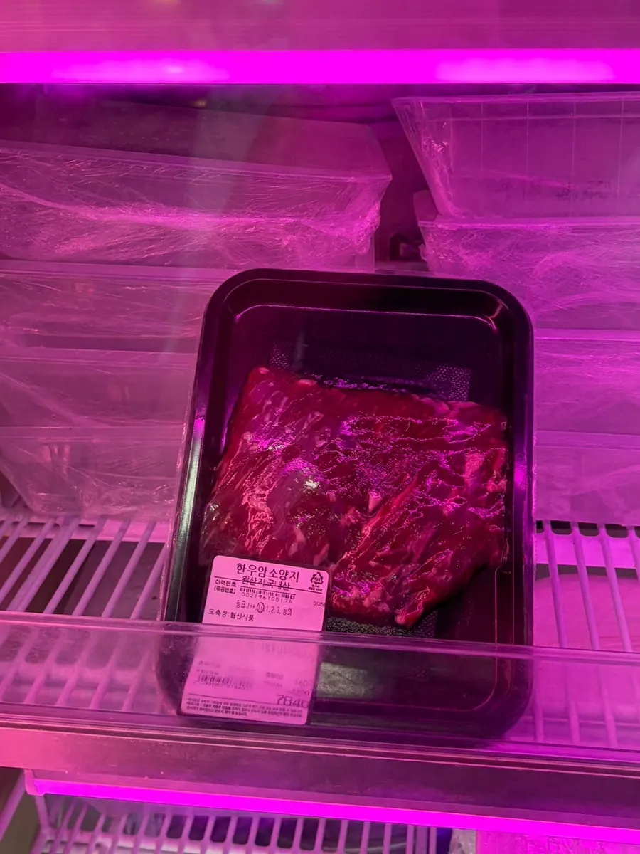 Display case with brisket point and beef short plate