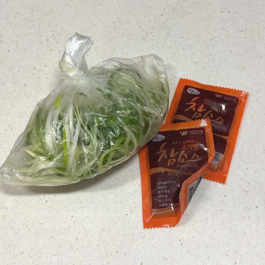 Scallion shreds and sesame sauce given as freebies