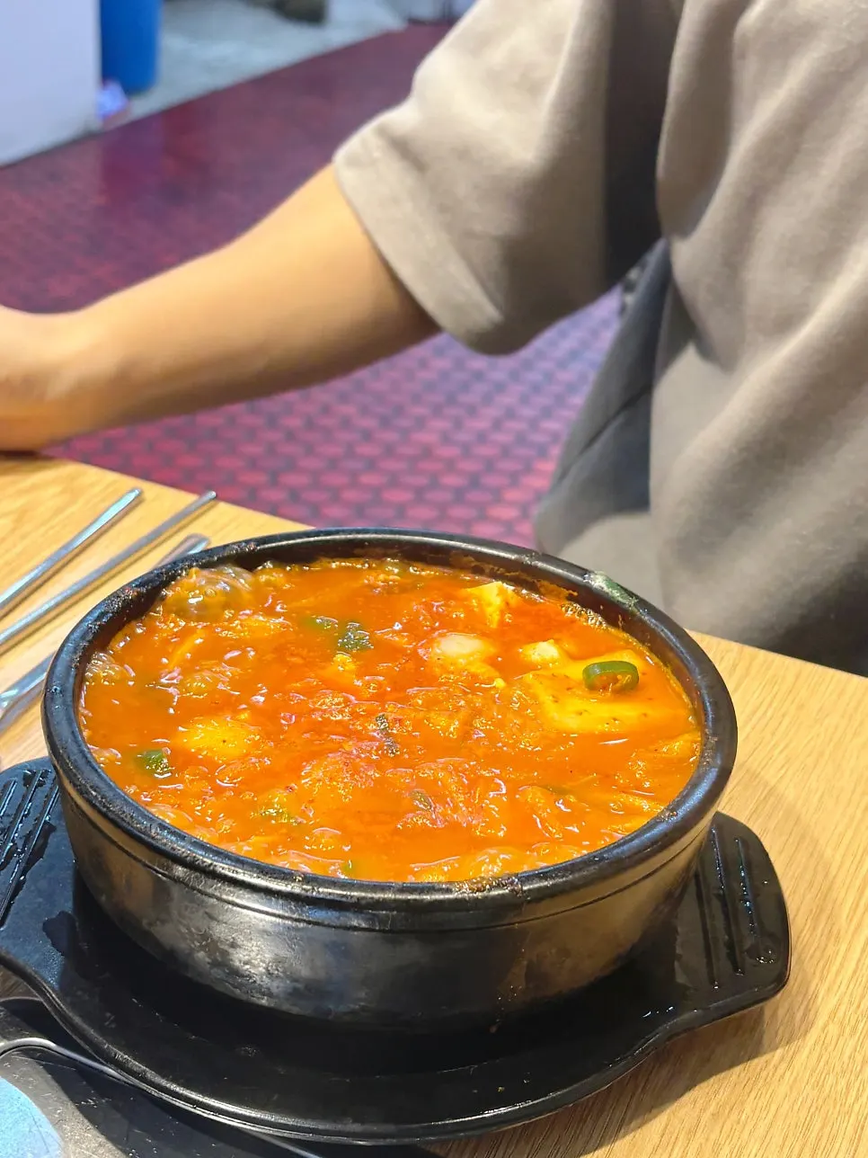 Tender pork inside the kimchi jjigae