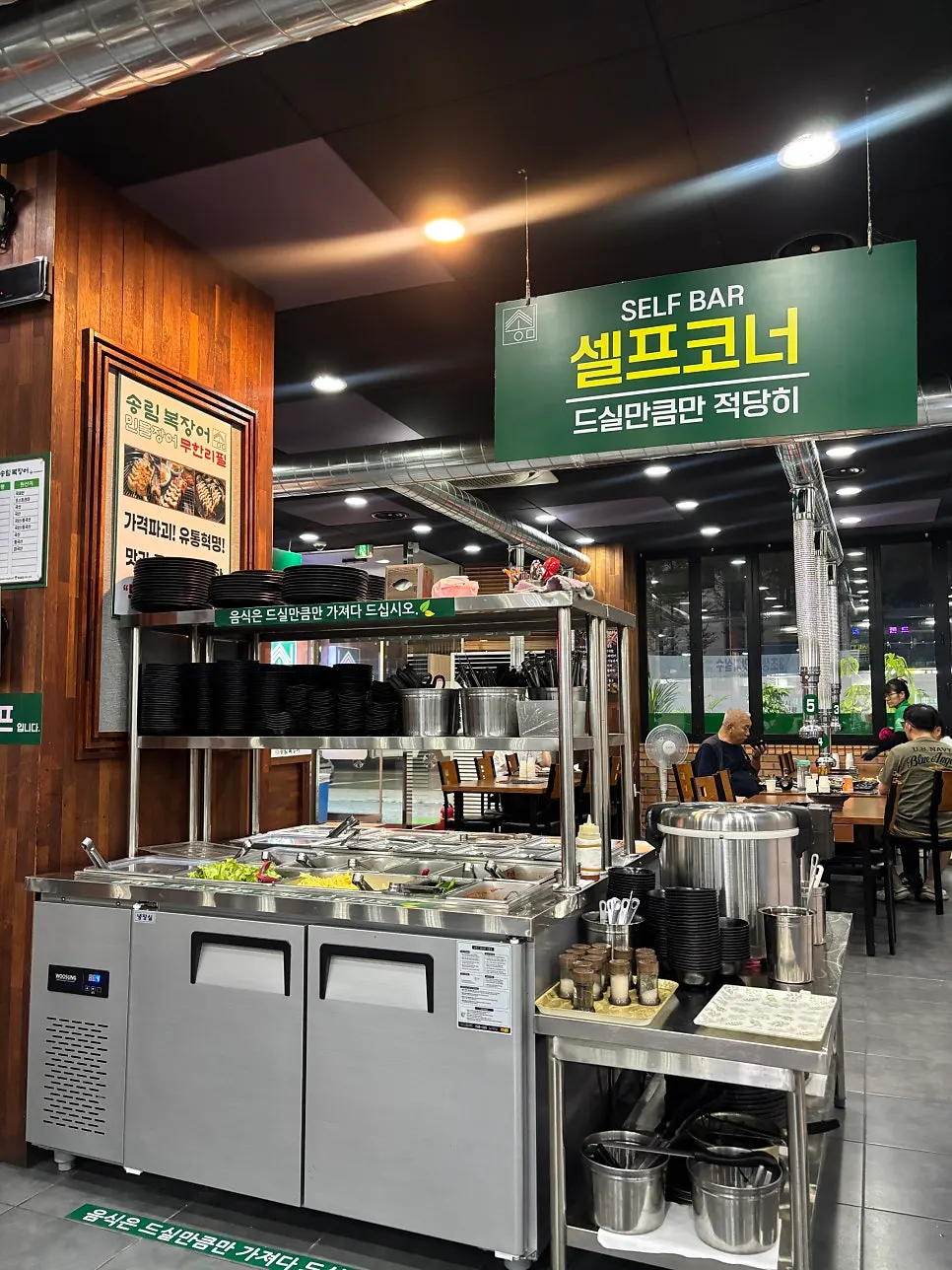 Self-service bar with side dishes for eel