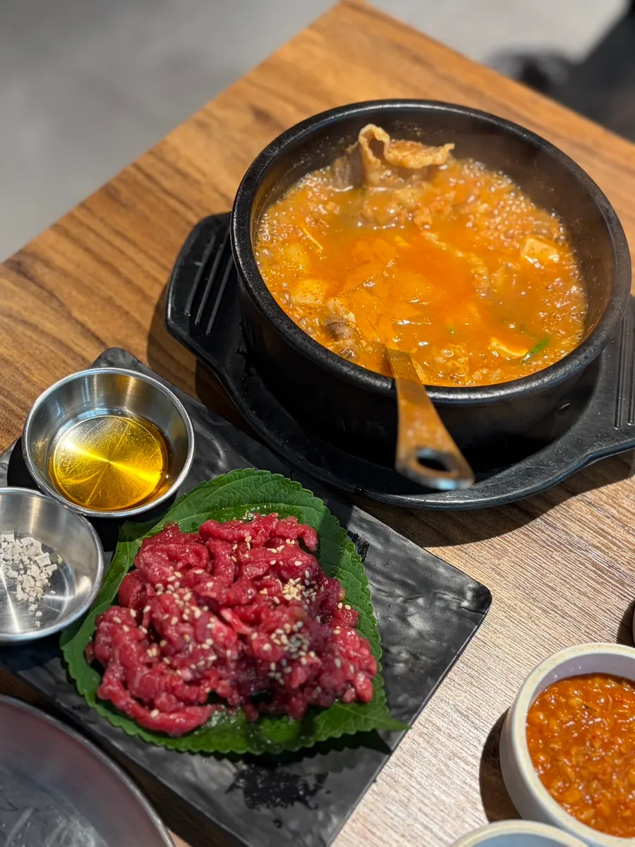Complimentary yukhoe and doenjang-jjigae