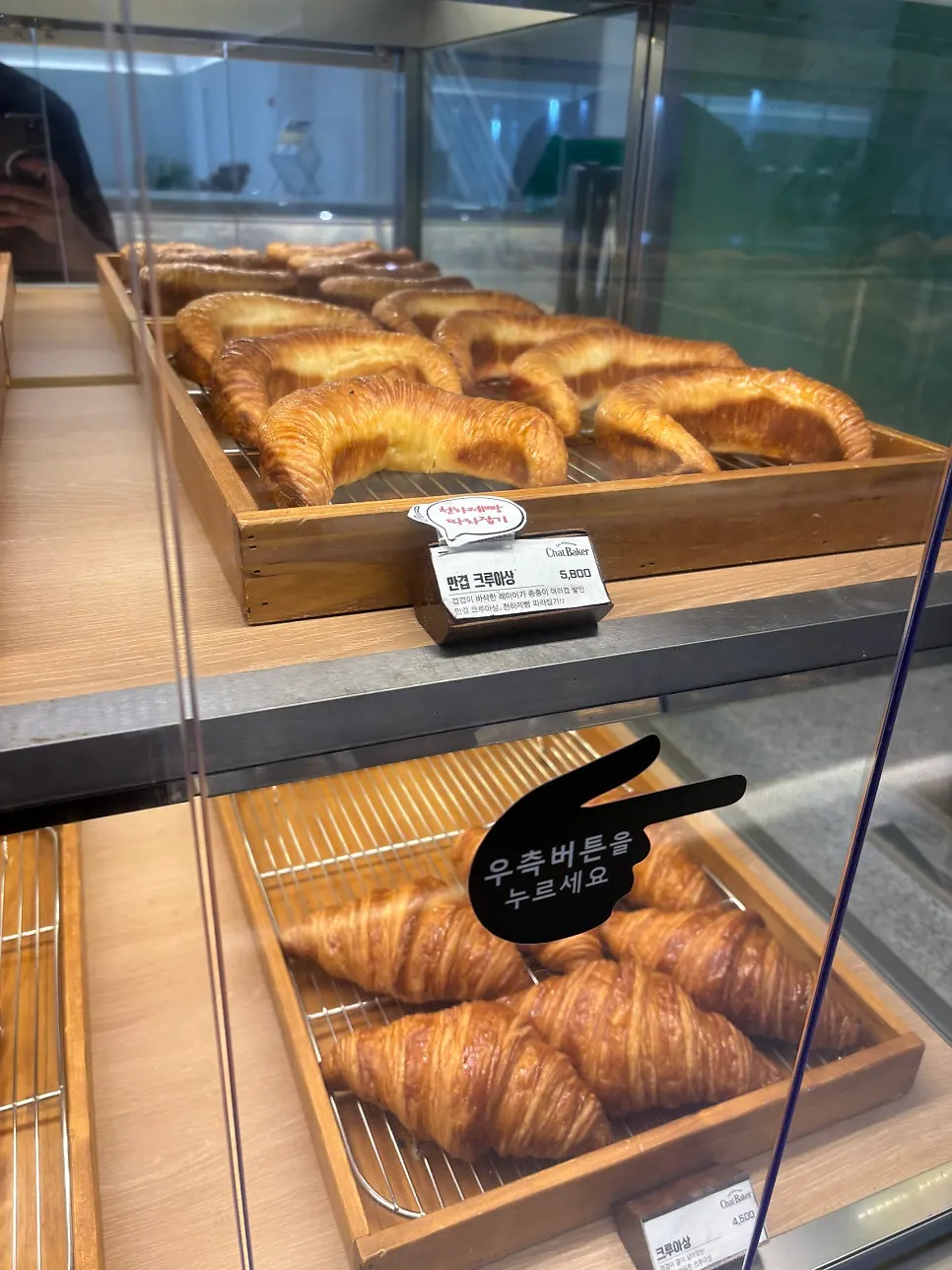 Bakery bread displayed under lighting