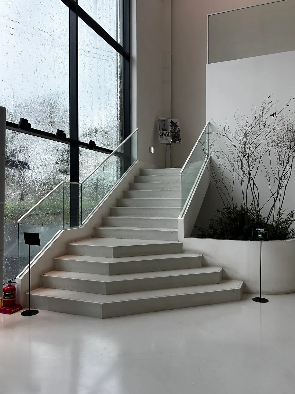 First floor with a water-sprayed window and terrace view