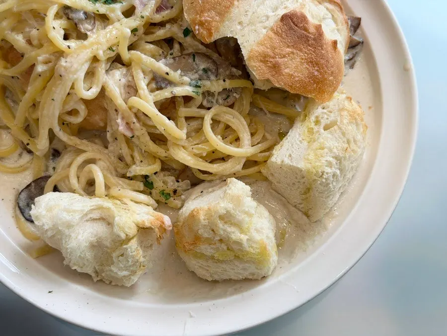 Bacon cream pasta inside the panne bread