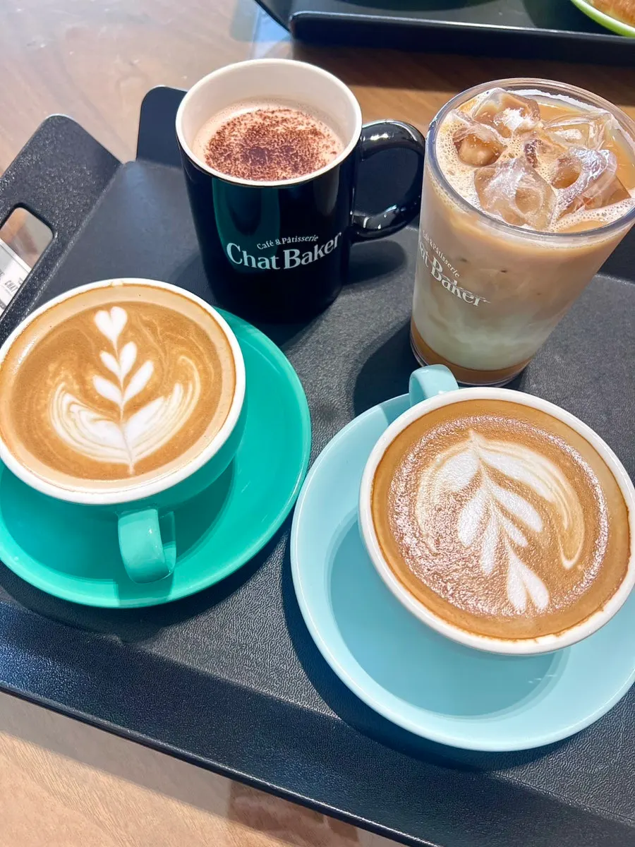 Four lattes on the table