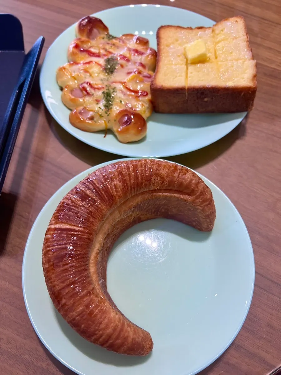 Croissant and latte on a plate