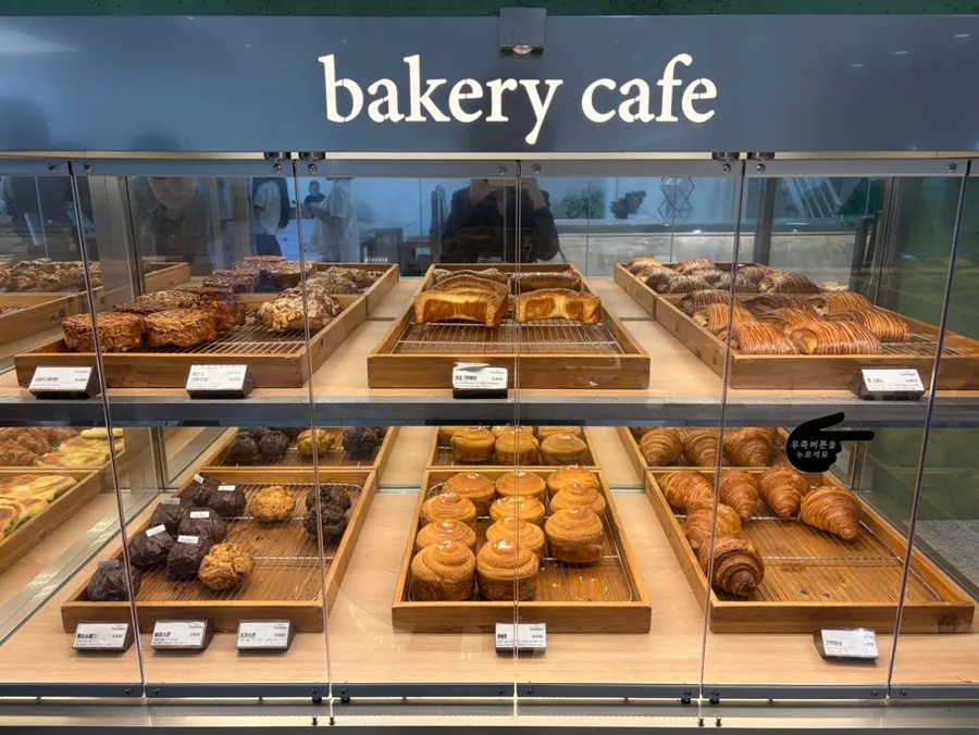 Full view of the bread display case at Chat Baker