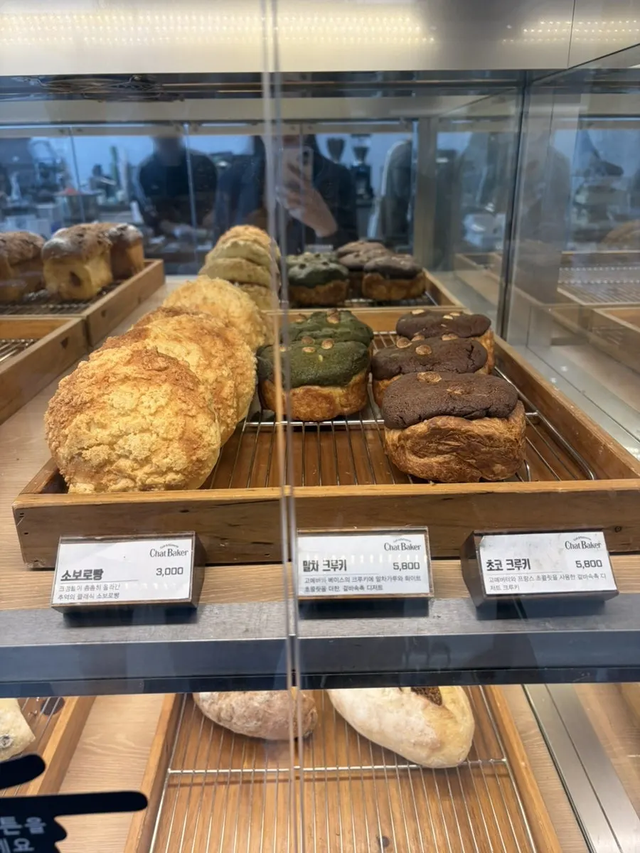 Various types of bread on the bakery shelf