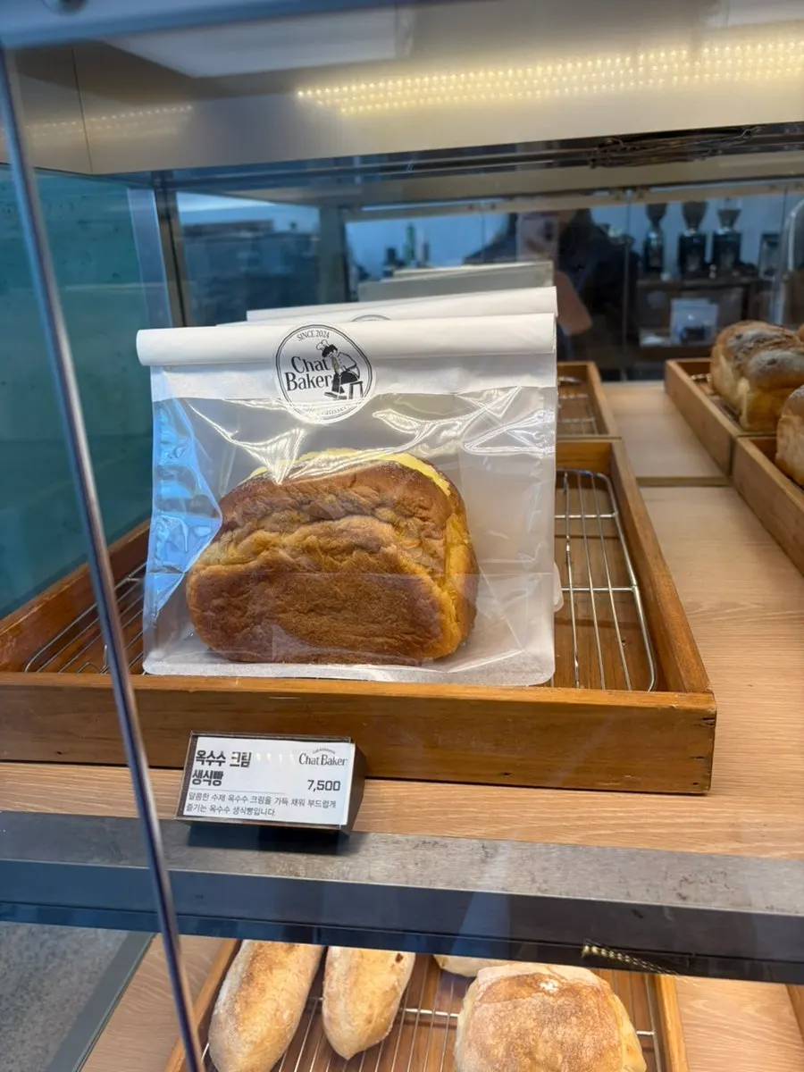 Corn cream fresh bread and other loaves on display