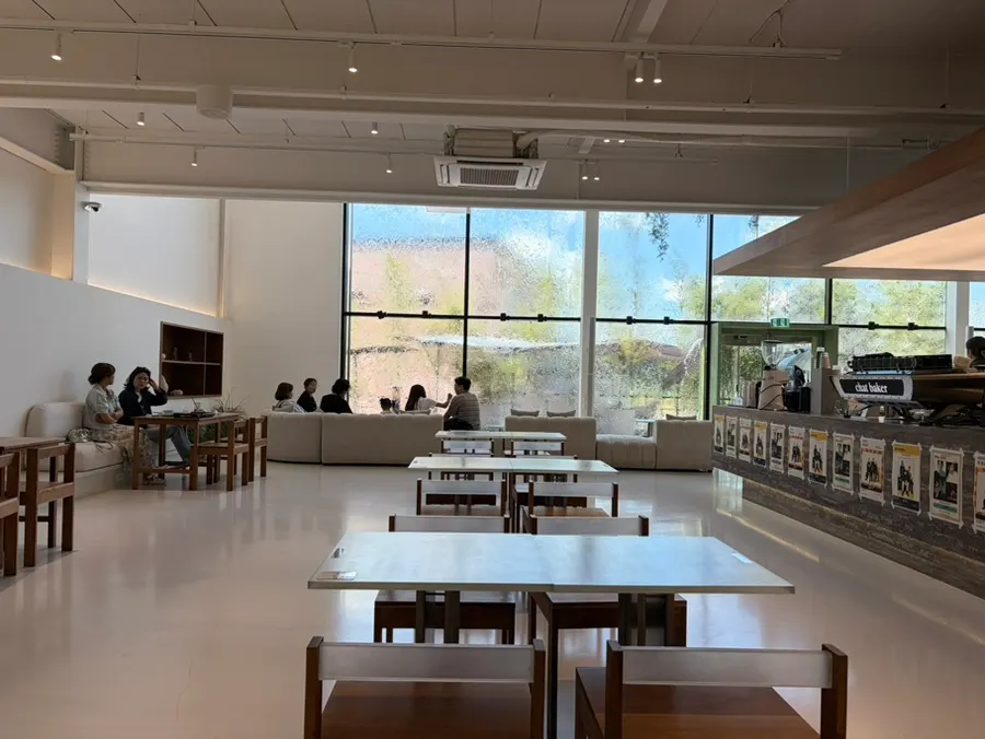 Chat Baker's floor-to-ceiling window with water streaming down it