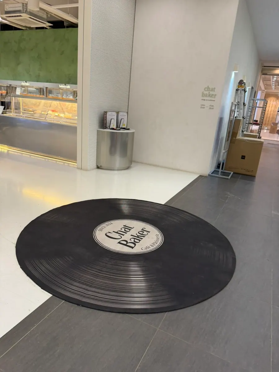 LP record mat at the entrance of Chat Baker