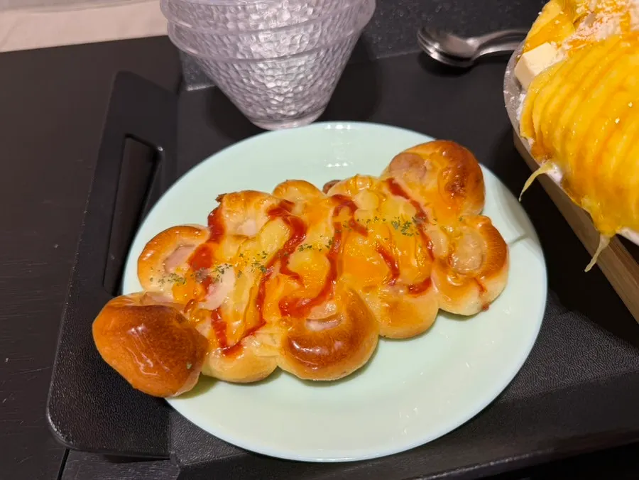 Chat Baker's sausage pizza bread eaten at home
