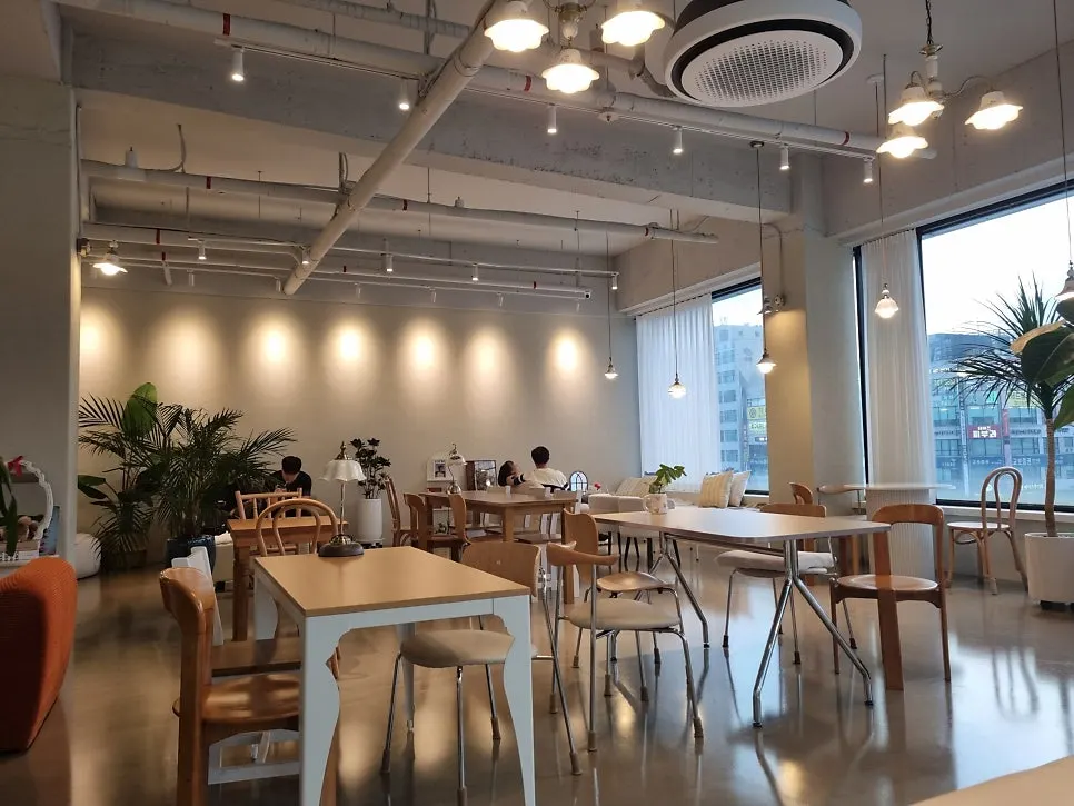 Nyanya interior with wooden chairs and tables