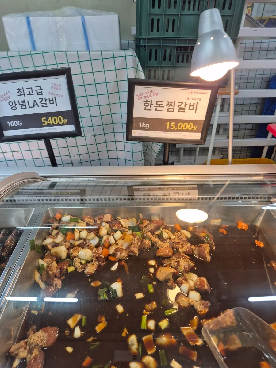 Price tags for LA-style marinated galbi and Korean pork jjimgalbi