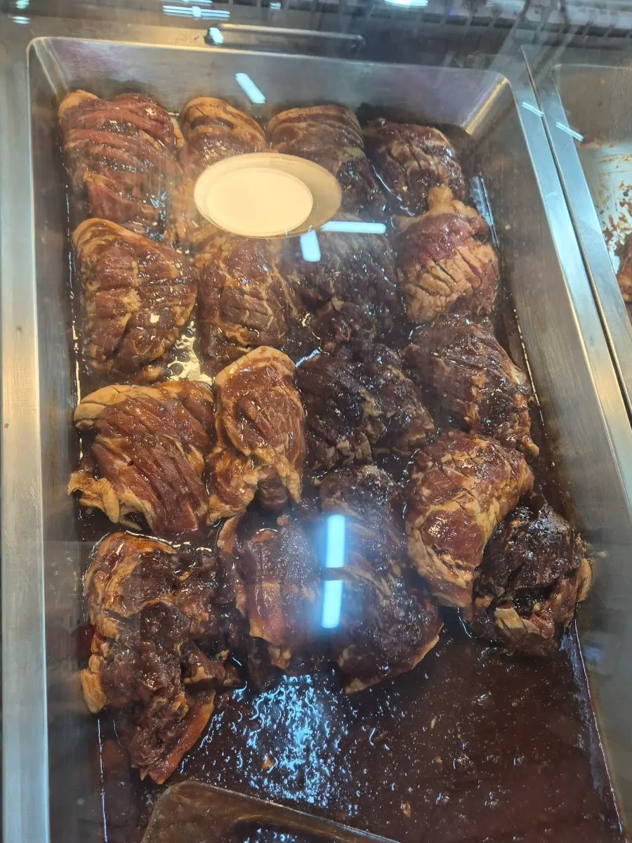Marinated meat display shelf at Morakmorak Home & Cook