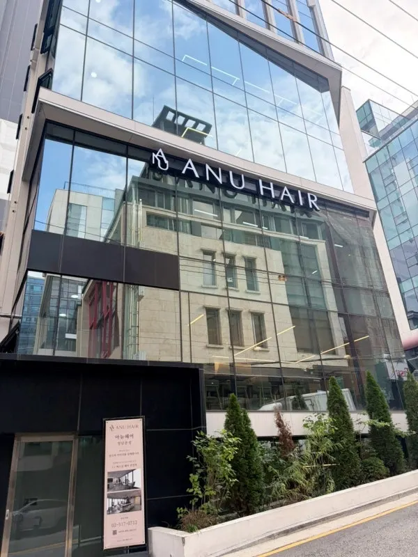 Entrance with the ANU HAIR sign visible
