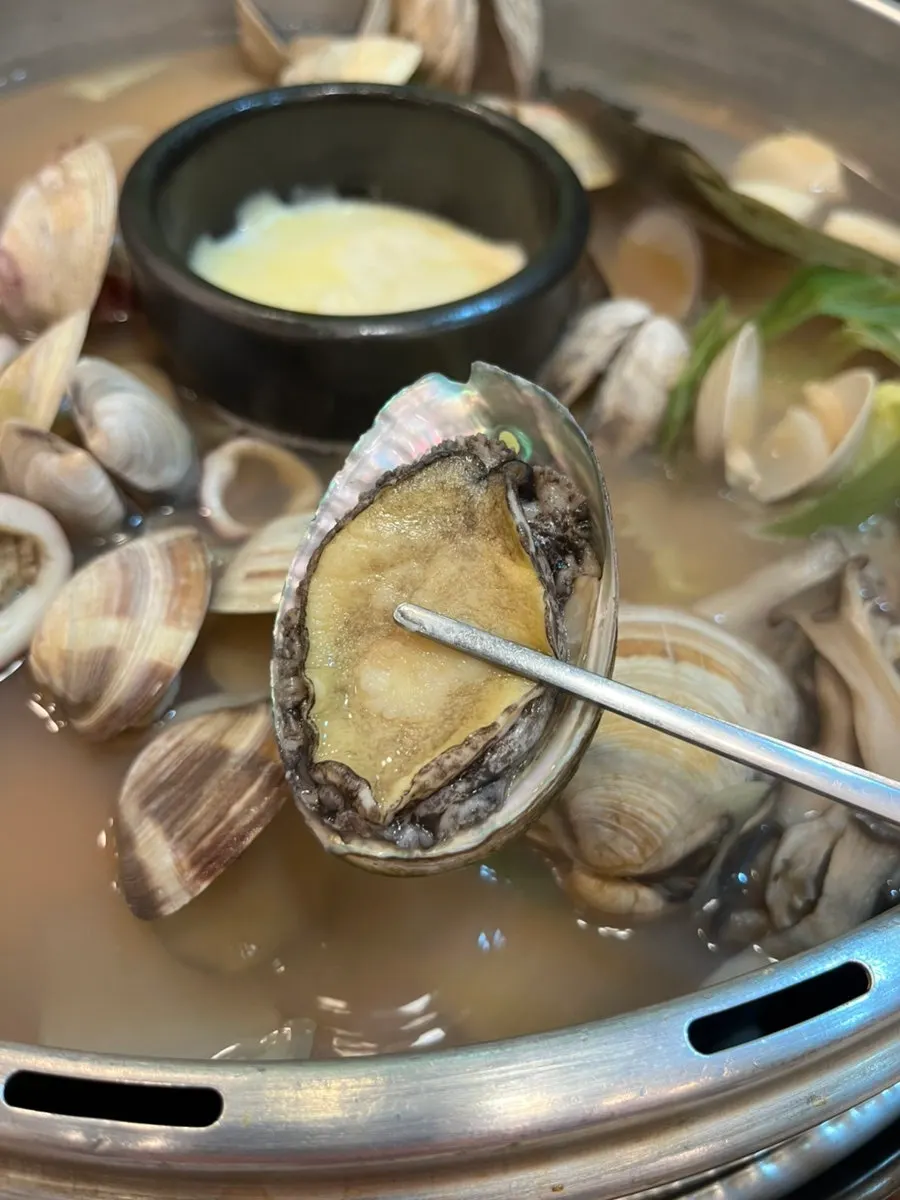 Abalone, one per person, in the hot pot