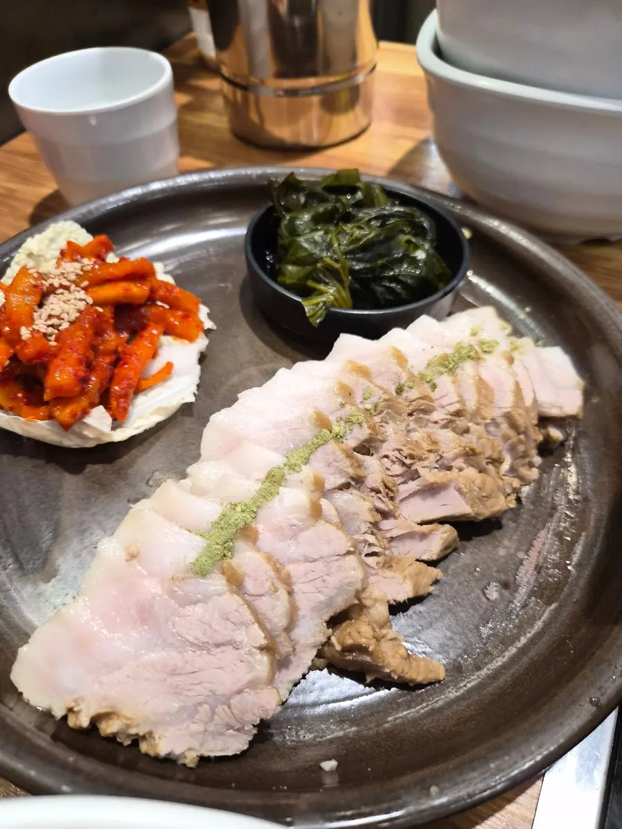 Vegetables added into the spicy shabu-shabu broth