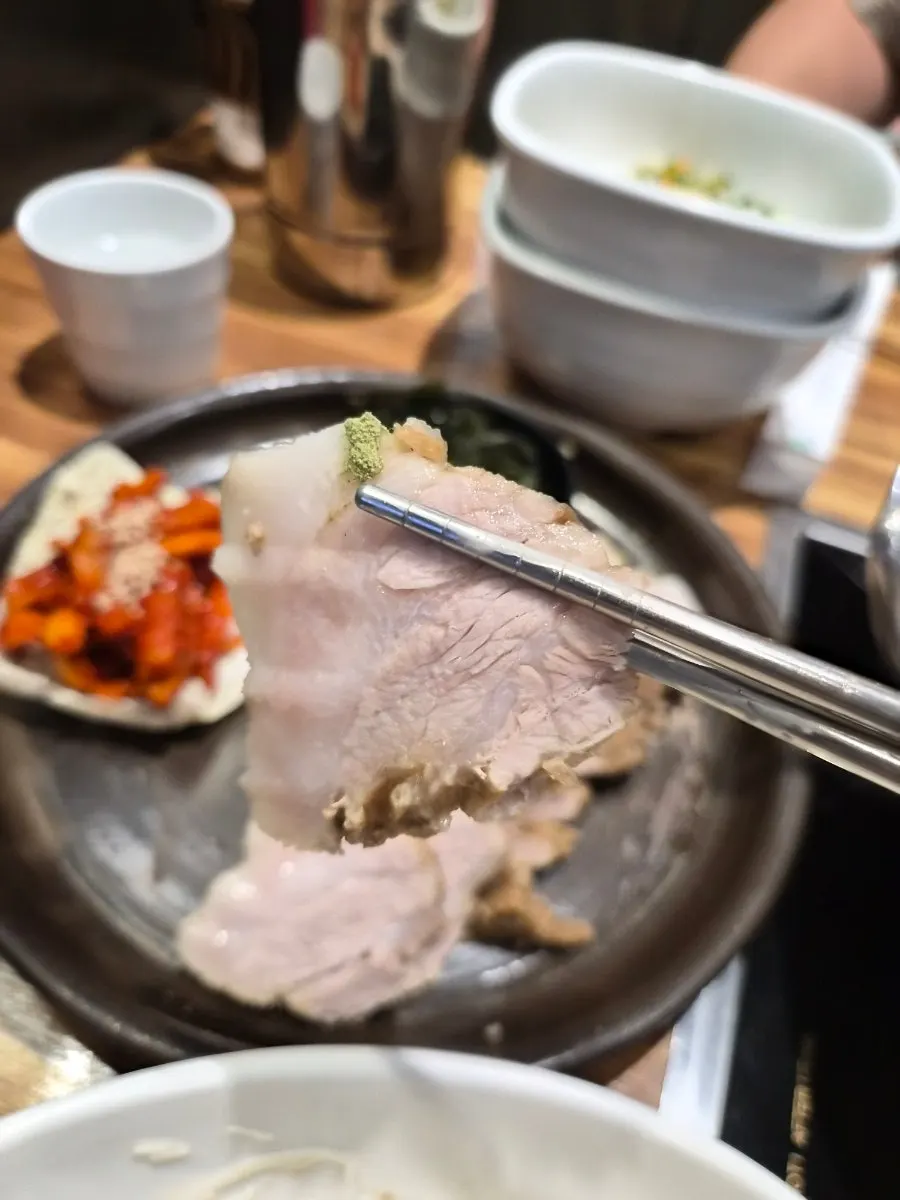 Table with bossam and shabu-shabu eaten together