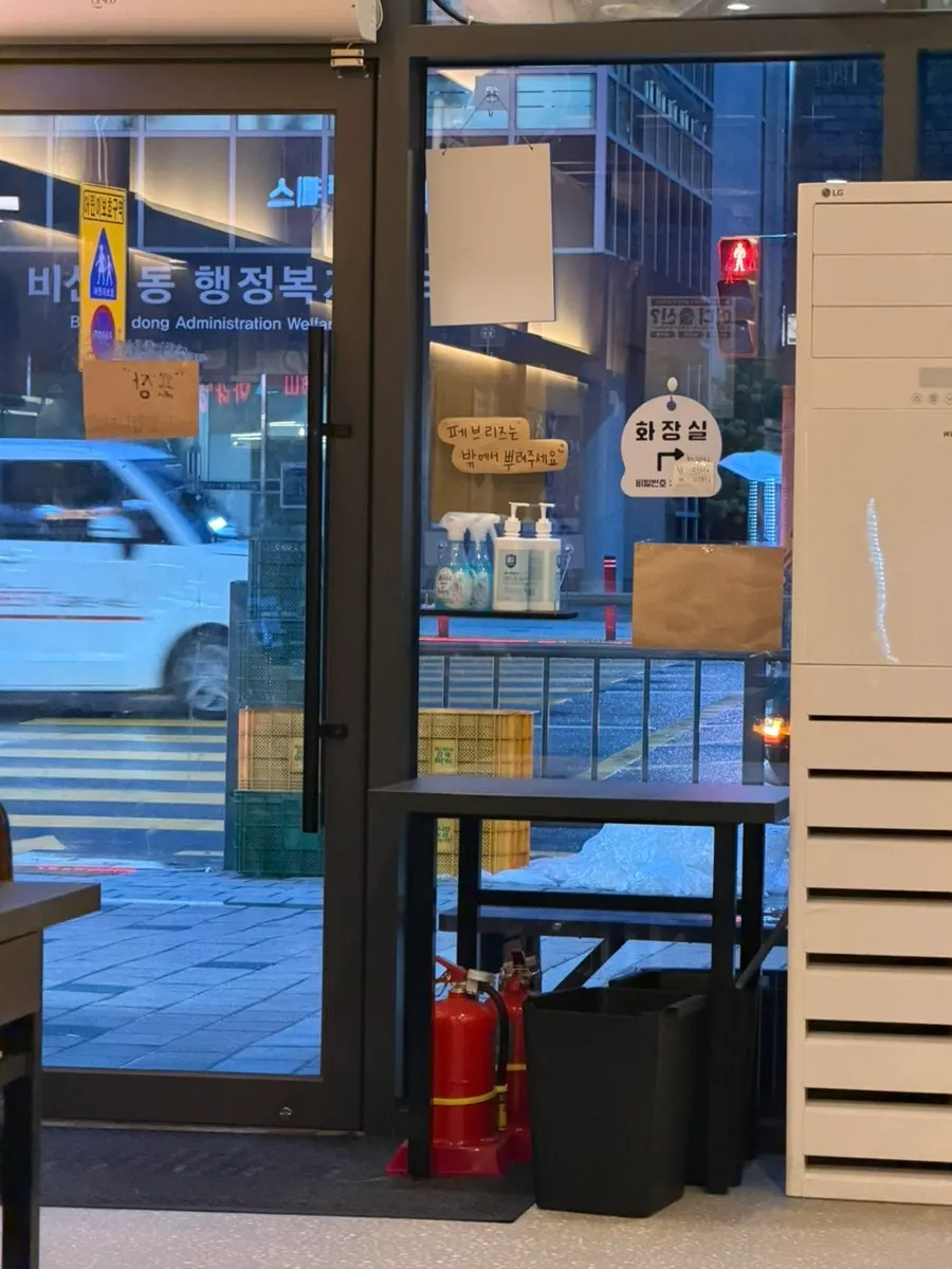 View of the shared building corridor outside the restaurant