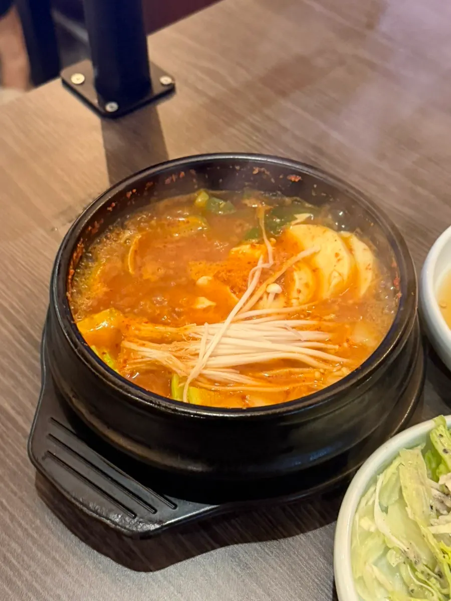 The large pot of soft tofu stew served for free