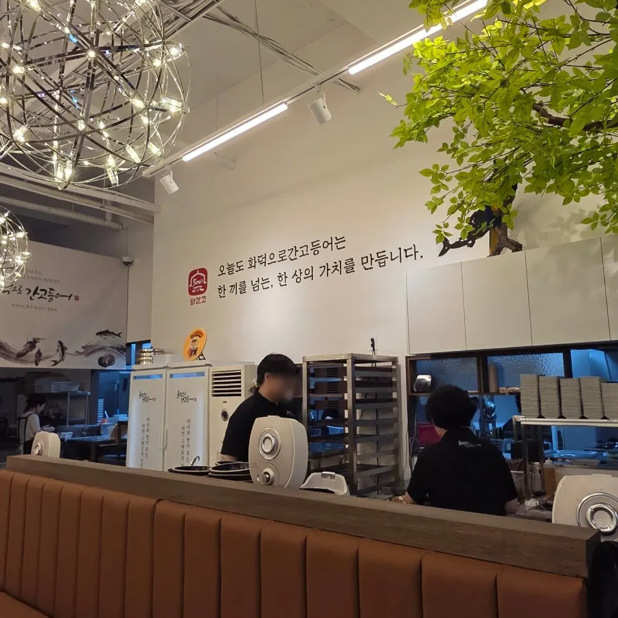Interior seating area of the grilled fish restaurant