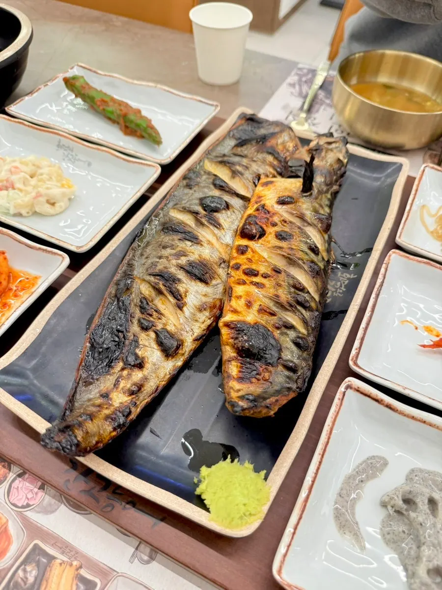 Menu board listing the mackerel set and hairtail set