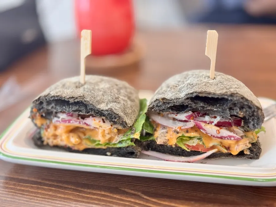 Close-up of the sandwich packed with chicken and vegetables