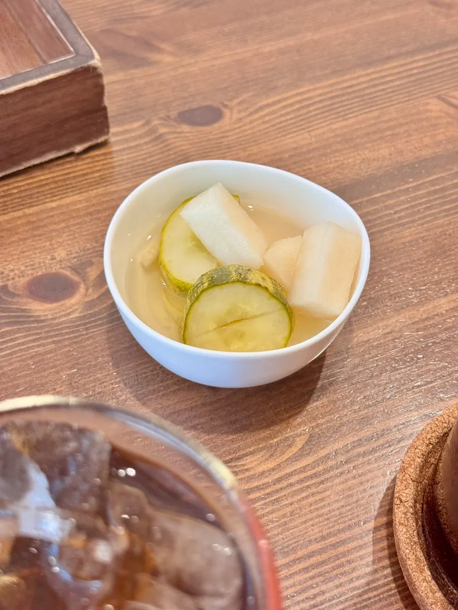 Housemade pickle served on the side