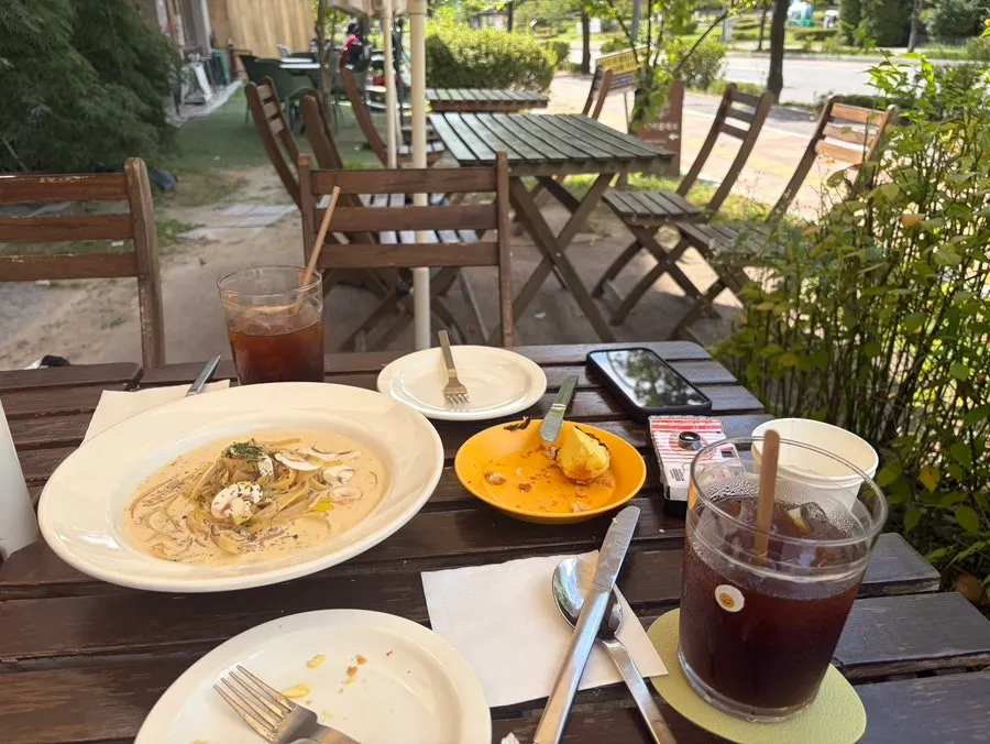 Mushroom cream fettuccine on the outdoor table