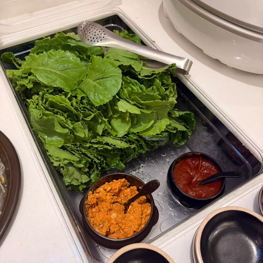 White rice and wrap vegetables at the self-service bar