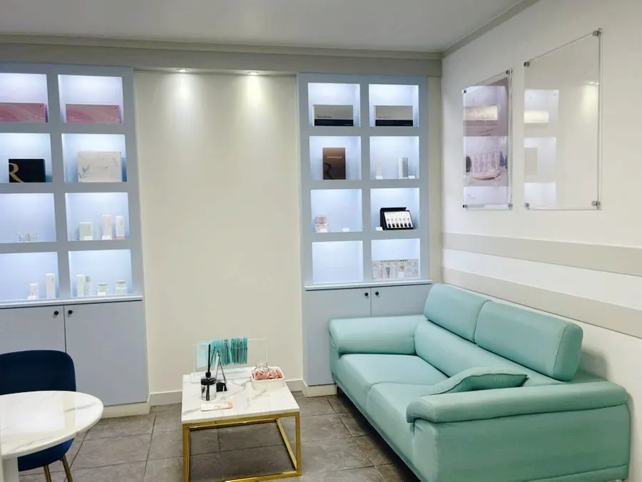 Interior of the esthetic clinic in white and mint tones
