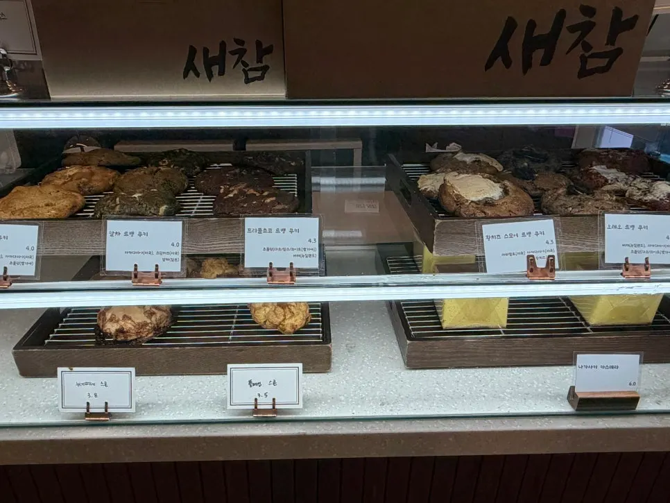 Display of levain cookies, scones, and other baked goods