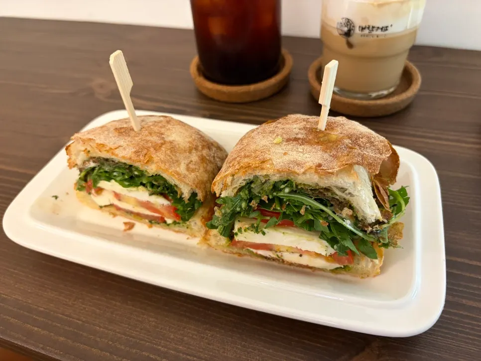 Cross-section of the ciabatta caprese basil sandwich