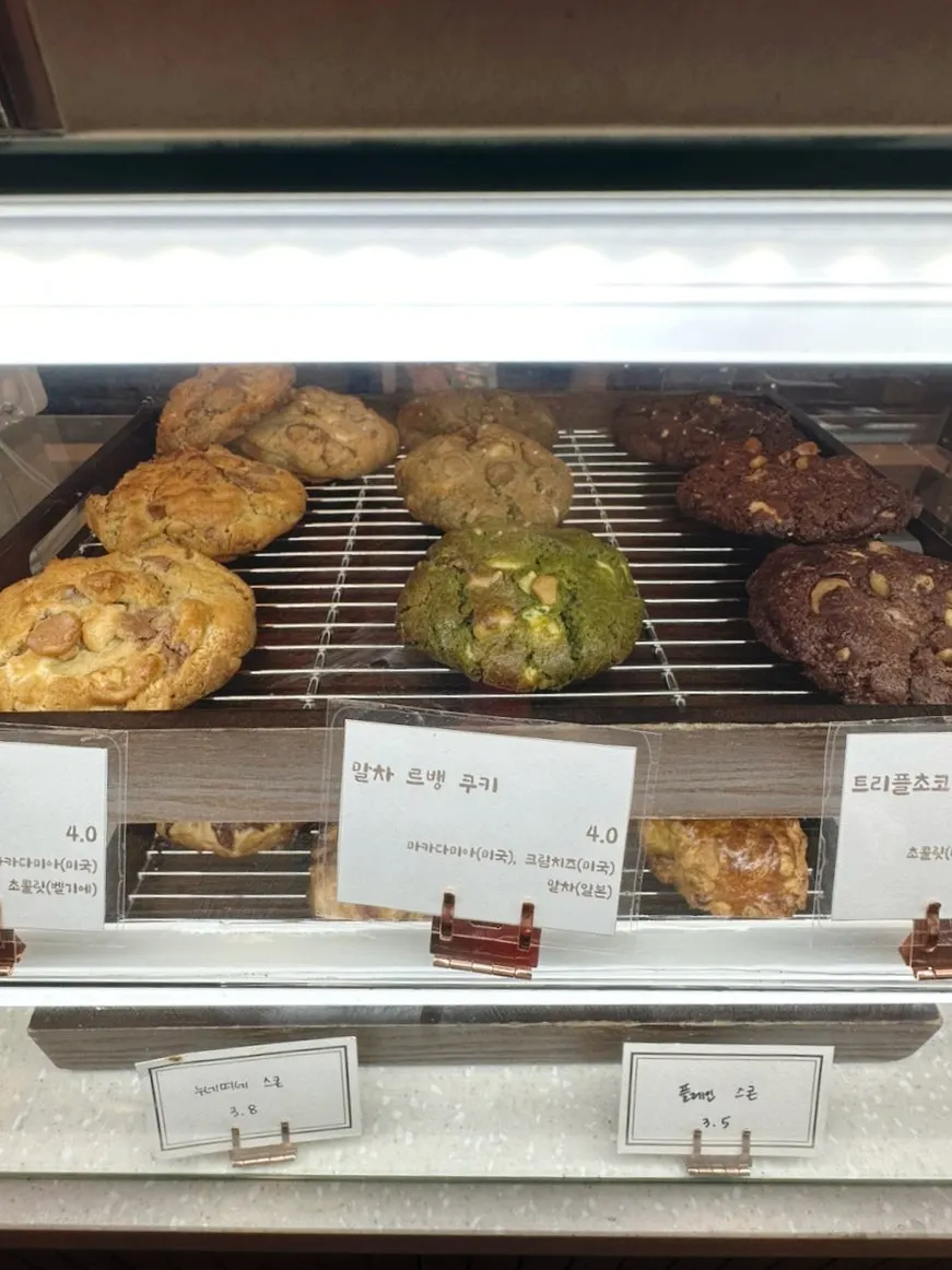 Shelf of takeout drip coffee and MD merchandise