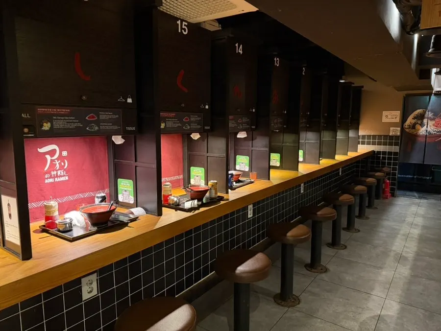 Interior of Aori's Whereabouts Unknown Uijeongbu Branch with Japanese ramen shop atmosphere