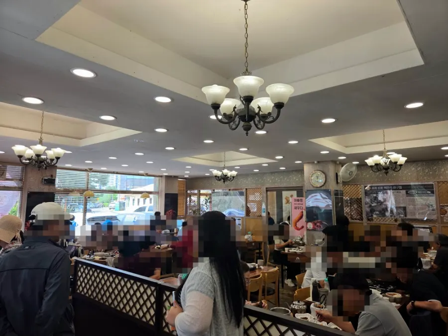 Spacious dining hall with many tables at Appa Jjim Hanam Main Branch