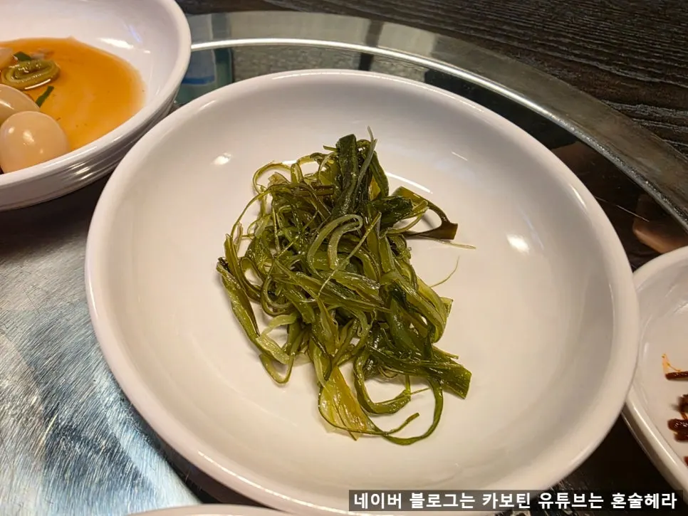 Napa cabbage pancake and pickled perilla leaves side dishes