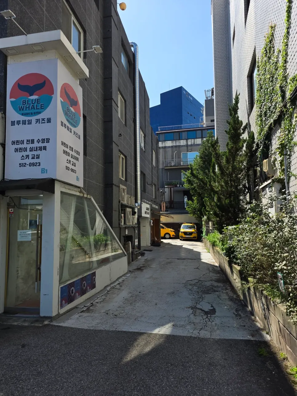 Exterior of Coup Barber & Coffee in an Apgujeong Station alley
