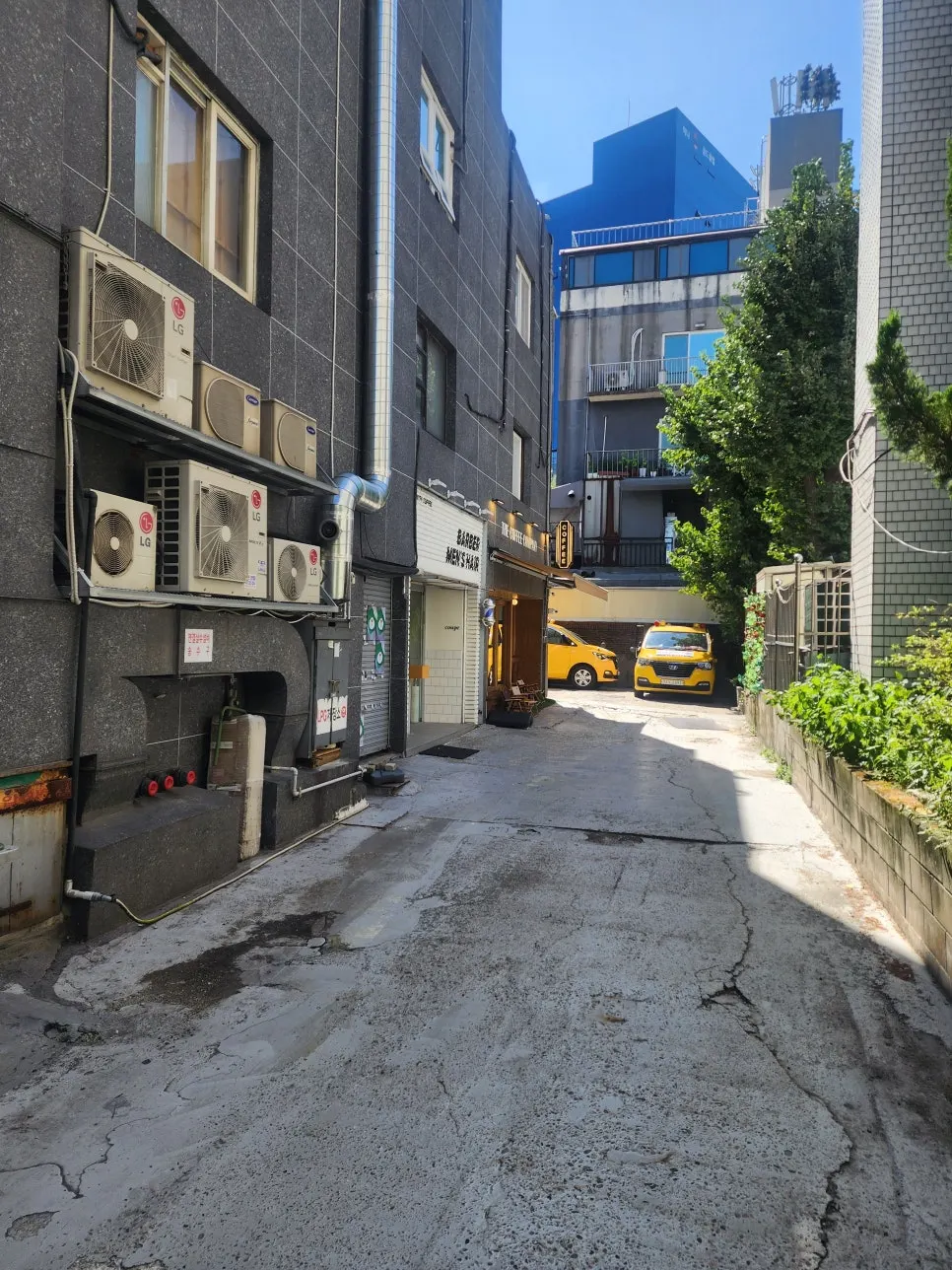 Entrance of Coup Barber & Coffee, an Apgujeong barber shop